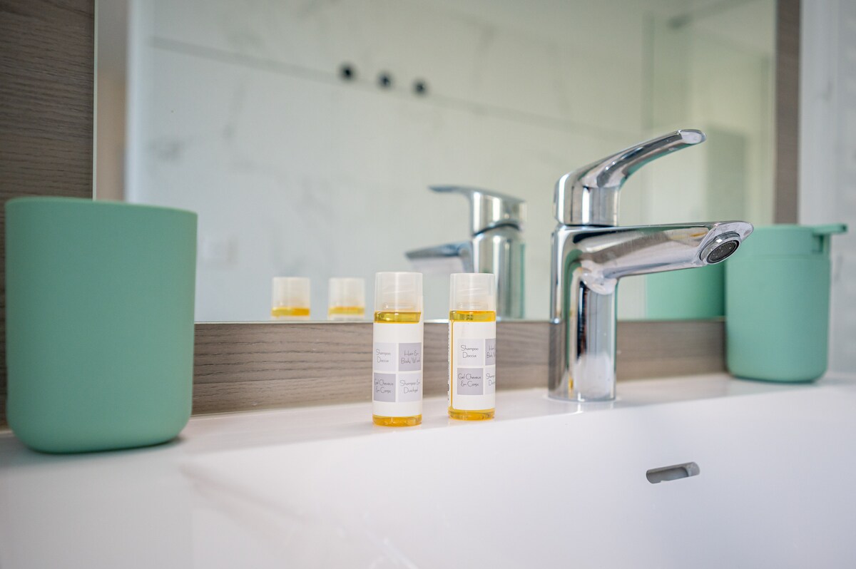 Modern bathroom vanity with toiletries