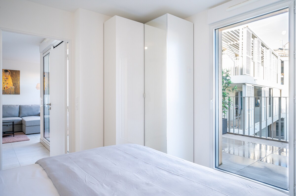 Bedroom with wardrobe and terrace window