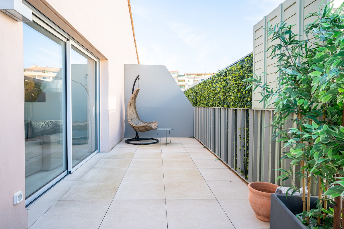 Private terrace with hanging egg chair