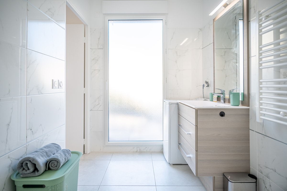 Bathroom with natural light and vanity