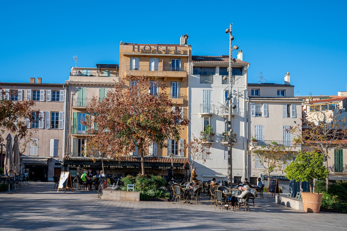 Antibes old town plaza with hotel and cafes