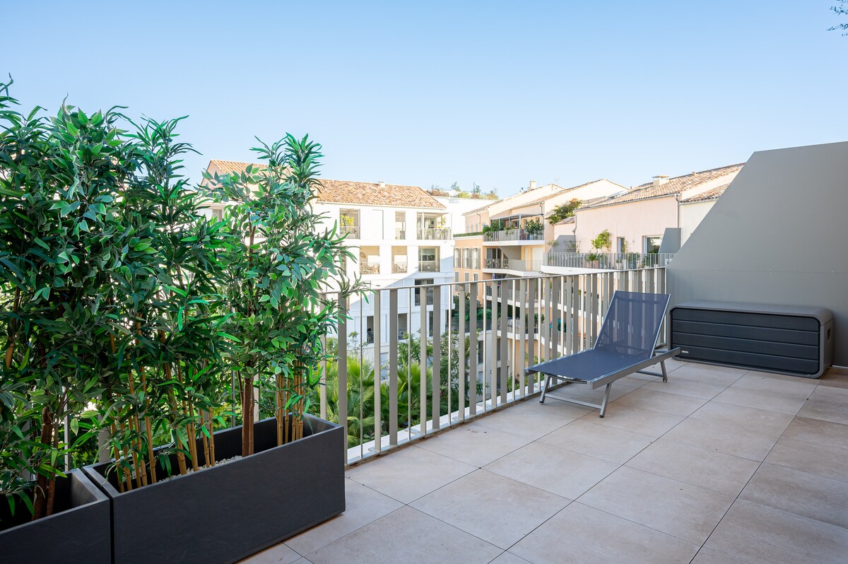 Terrace with sun lounger and garden view