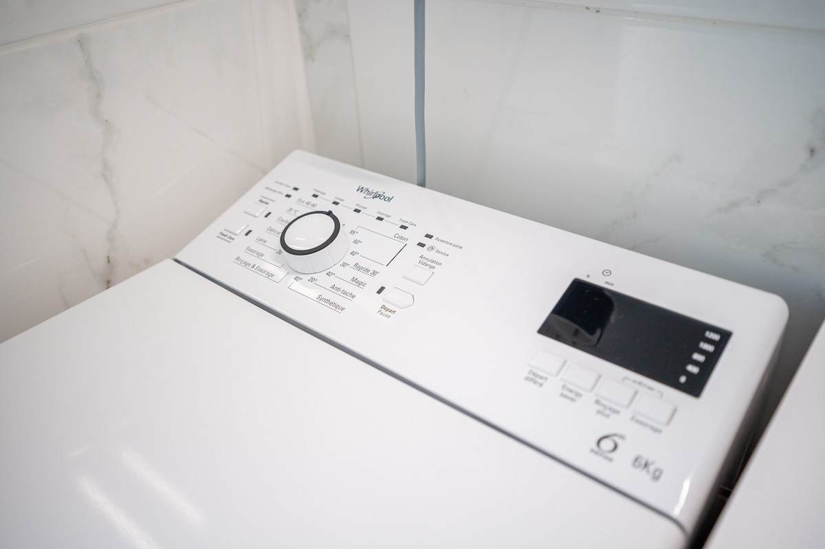 Whirlpool washing machine in bathroom